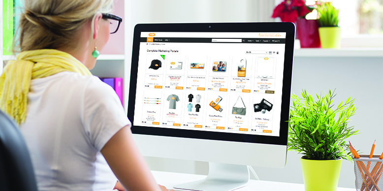 Person viewing a marketing products webpage on a computer, showcasing promotional items and branded merchandise, emphasizing personalization in marketing strategies.