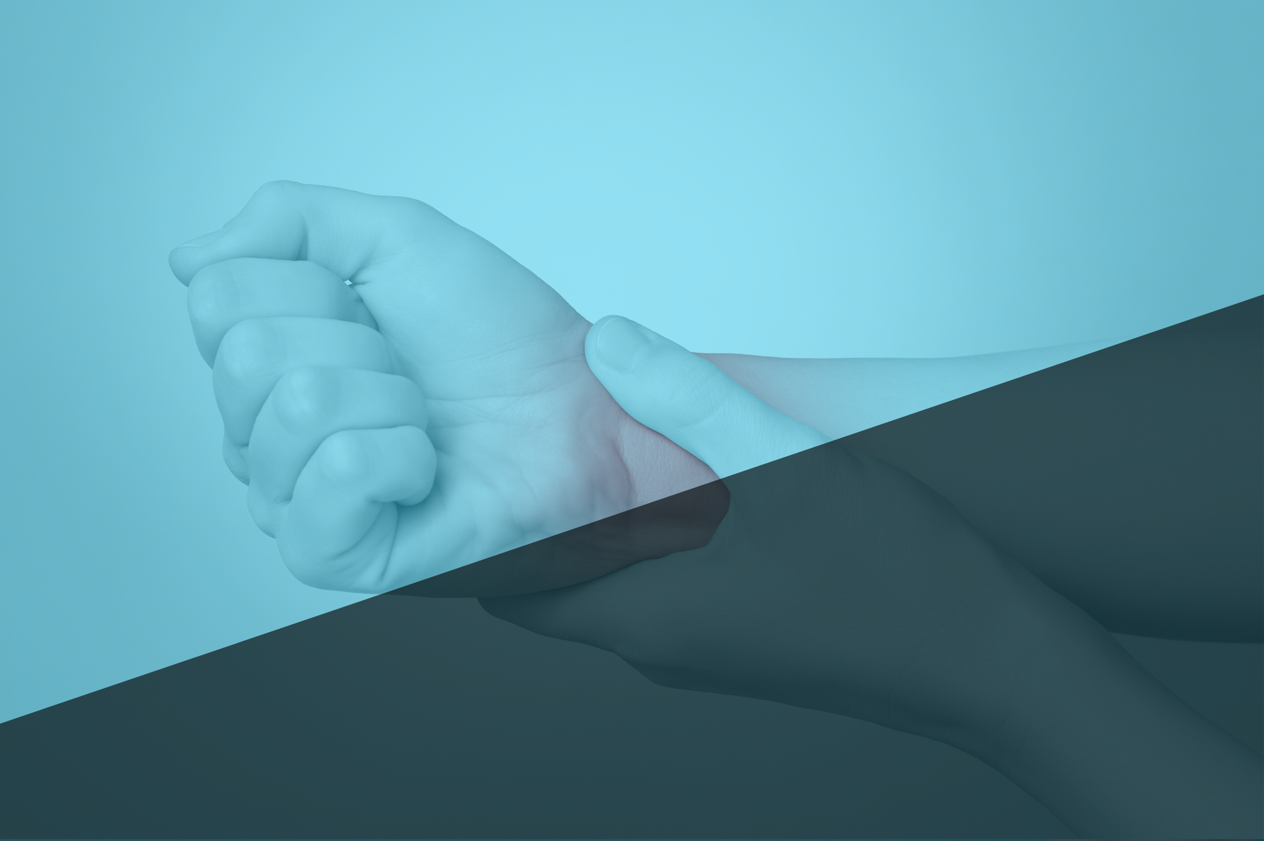 Hands gripping each other, symbolizing the concept of addressing pain points in sales and marketing strategies.