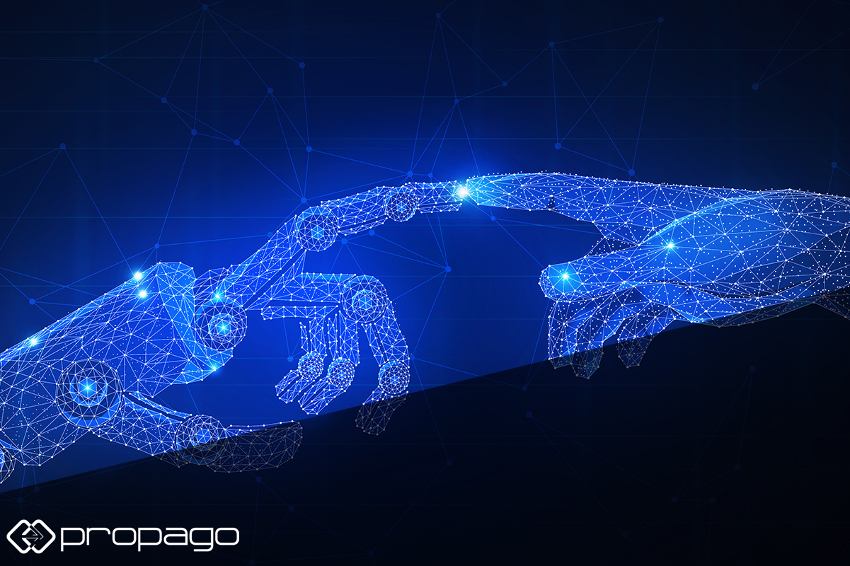 Hands of a human and a robotic arm reaching towards each other, symbolizing the convergence of technology and humanity in Industry 4.0, with a digital network background.